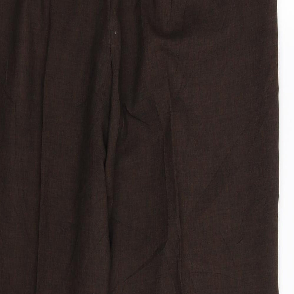 Brand and care label for Marks & Spencer women’s grey trousers, size UK 16, 29-inch leg