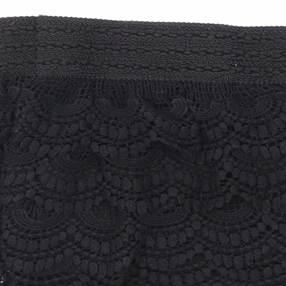 Brand and care label for Preworn women’s black mini skirt