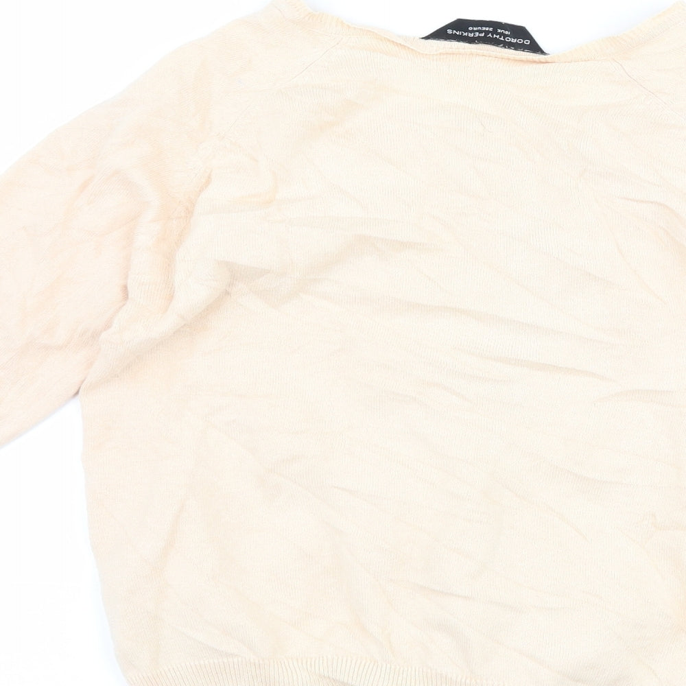 Brand and care label for Dorothy Perkins women’s pink cape jumper, size UK 8