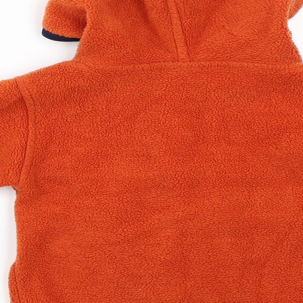 Brand and care label for ADISPORT boys’ orange fleece jumper, size 6-9, months