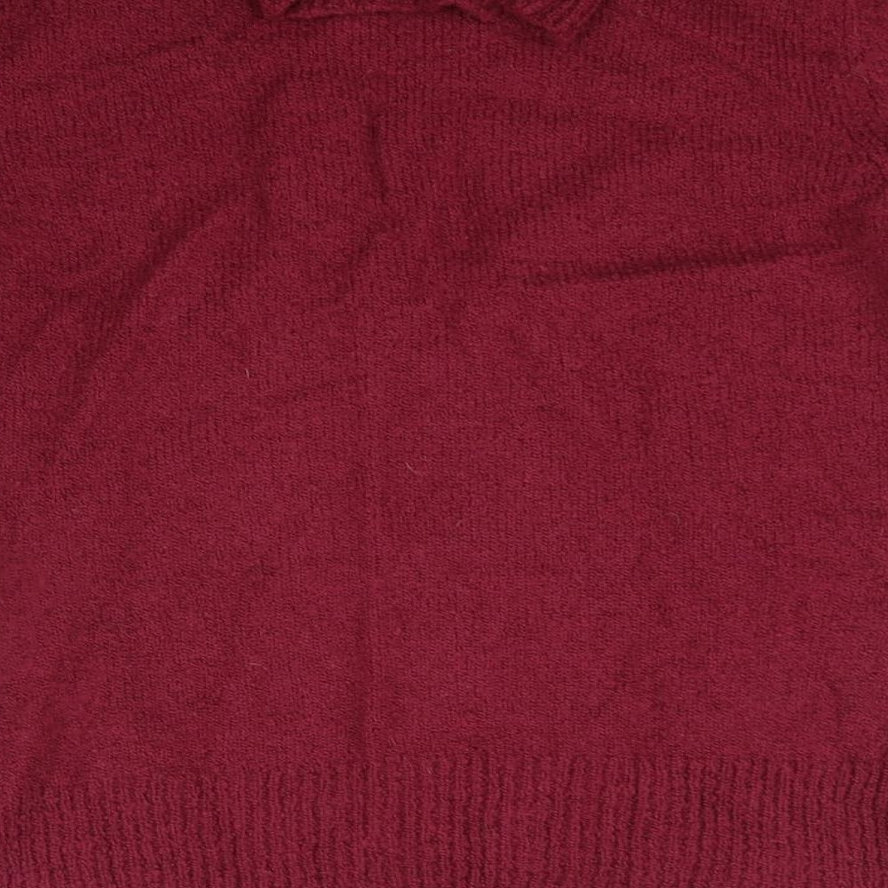 Brand and care label for Kliss women’s purple jumper, size L