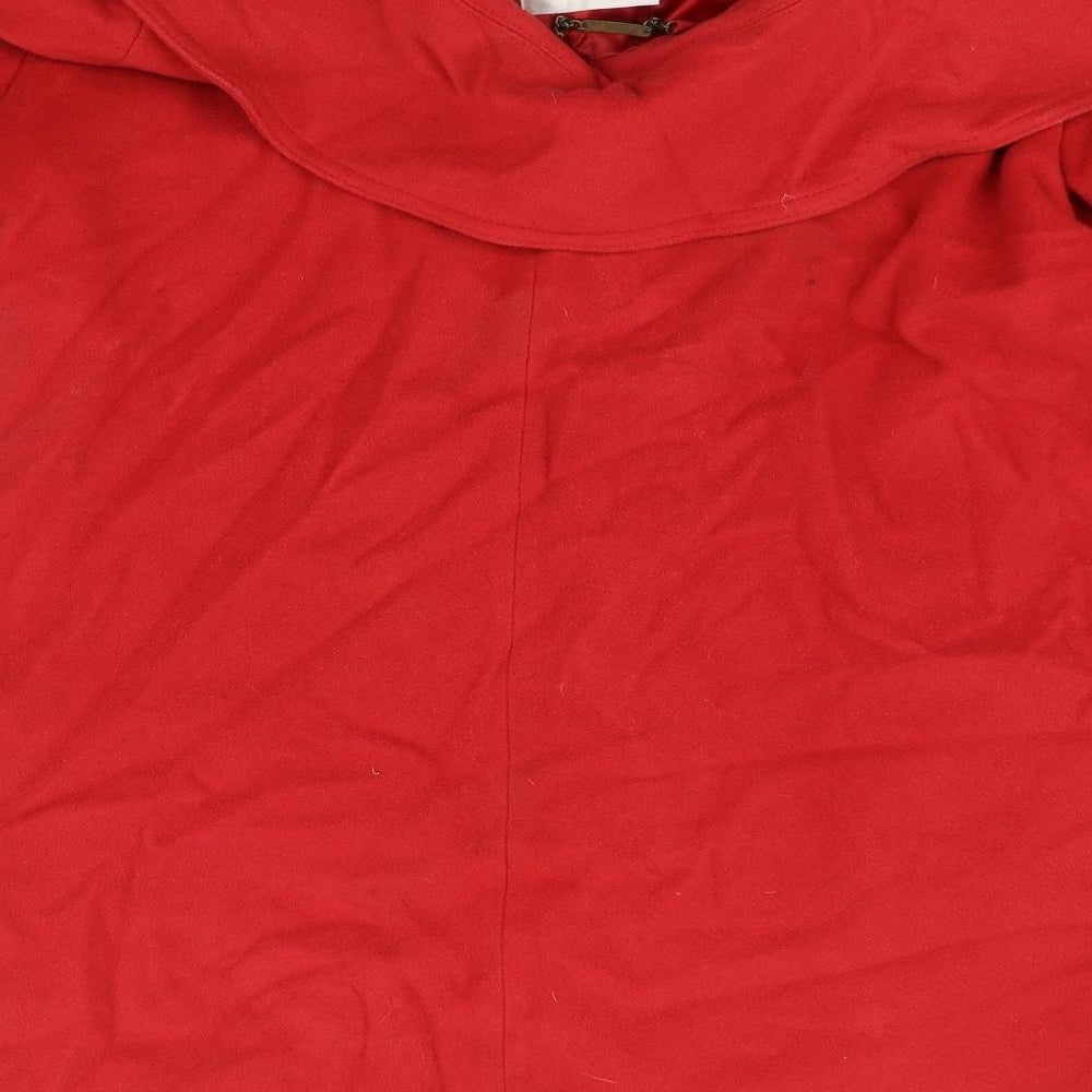 Brand and care label for Country Casuals women’s red jacket, size M