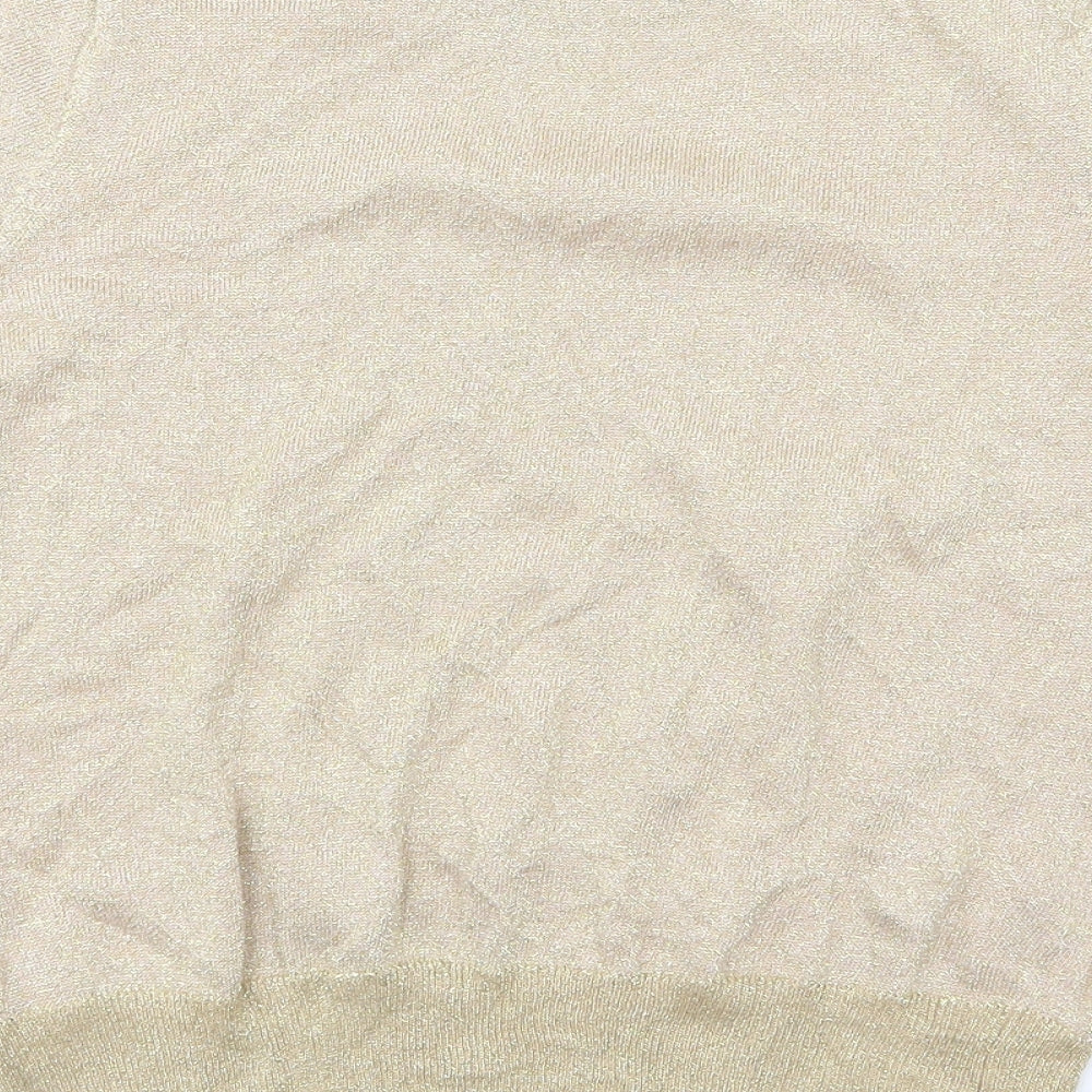 Brand and care label for Marks & Spencer women’s gold knit jumper, size M