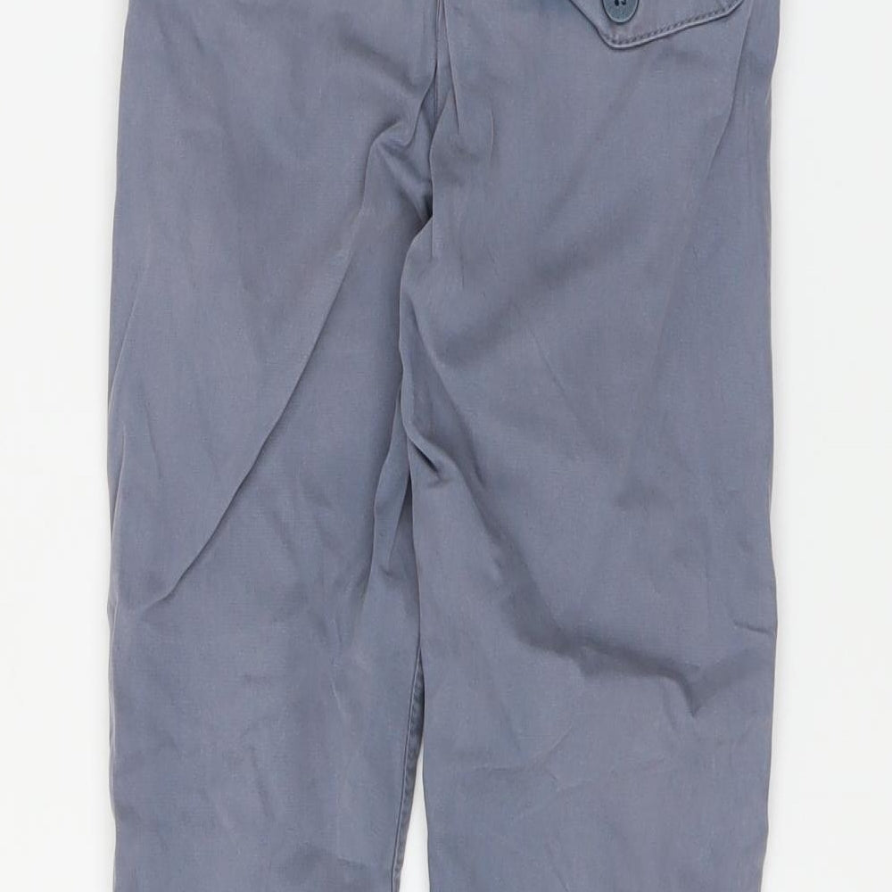 Brand and care label for Next boys’ blue straight jeans, size 5, years