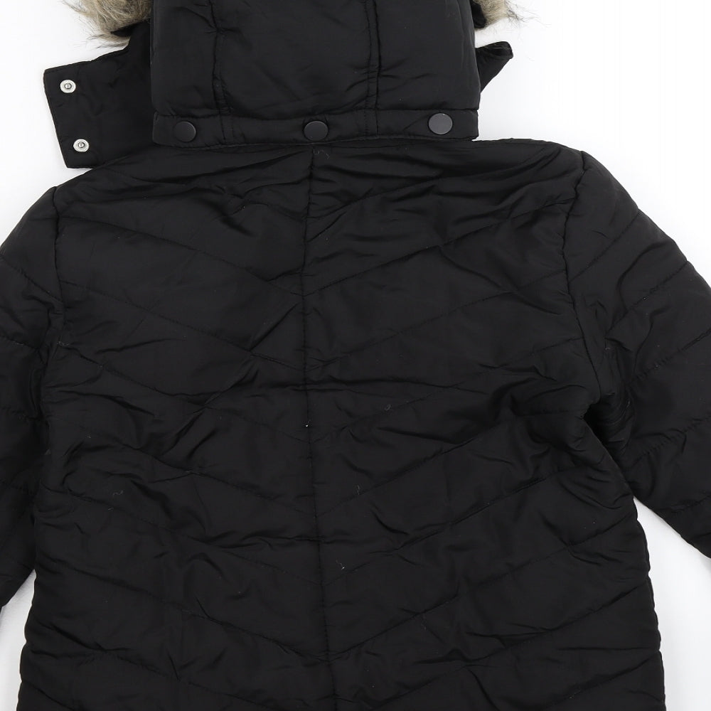 Brand and care label for Avenue women’s black quilted jacket, size UK 8