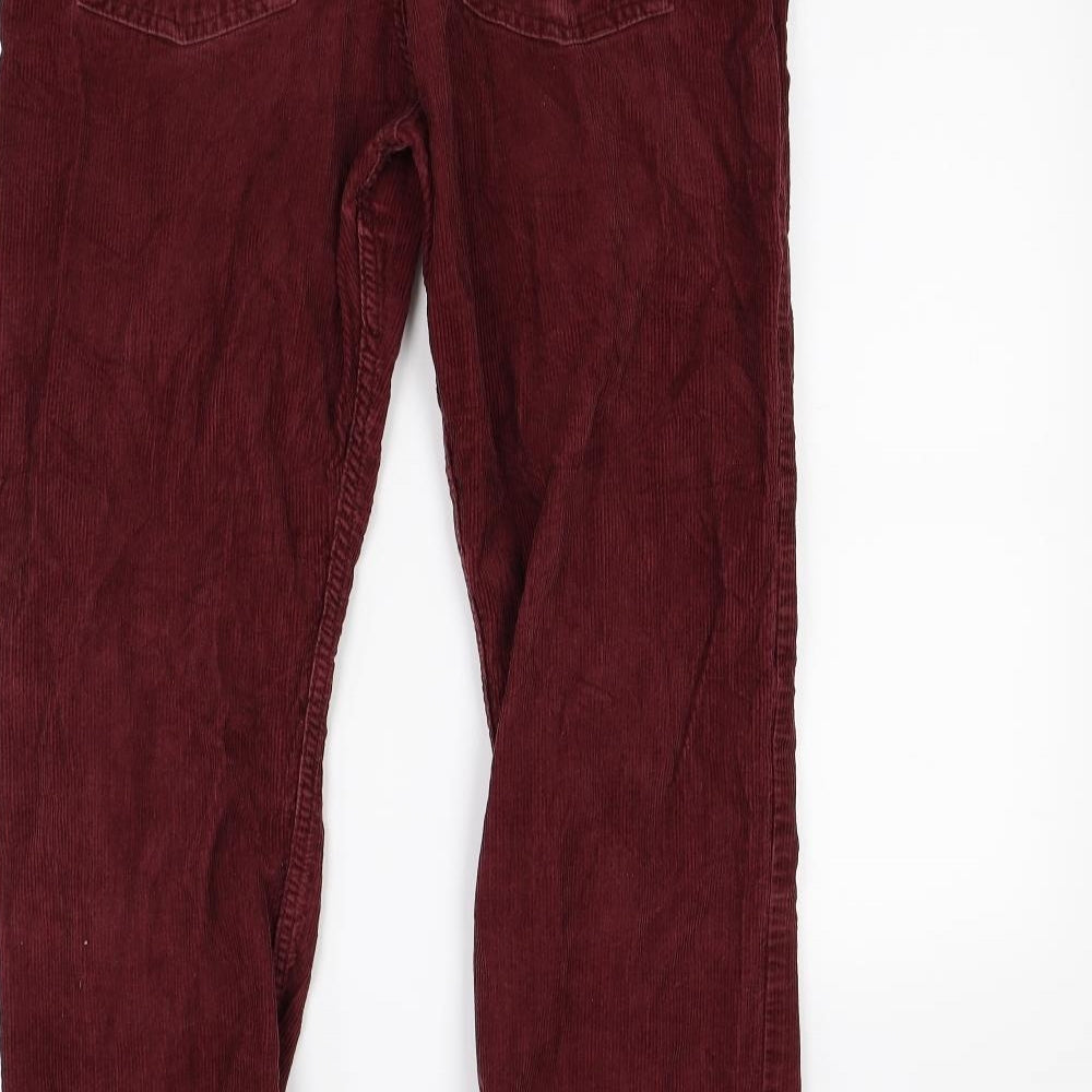 Brand and care label for Marks & Spencer men’s red trousers, size S, 28-inch leg