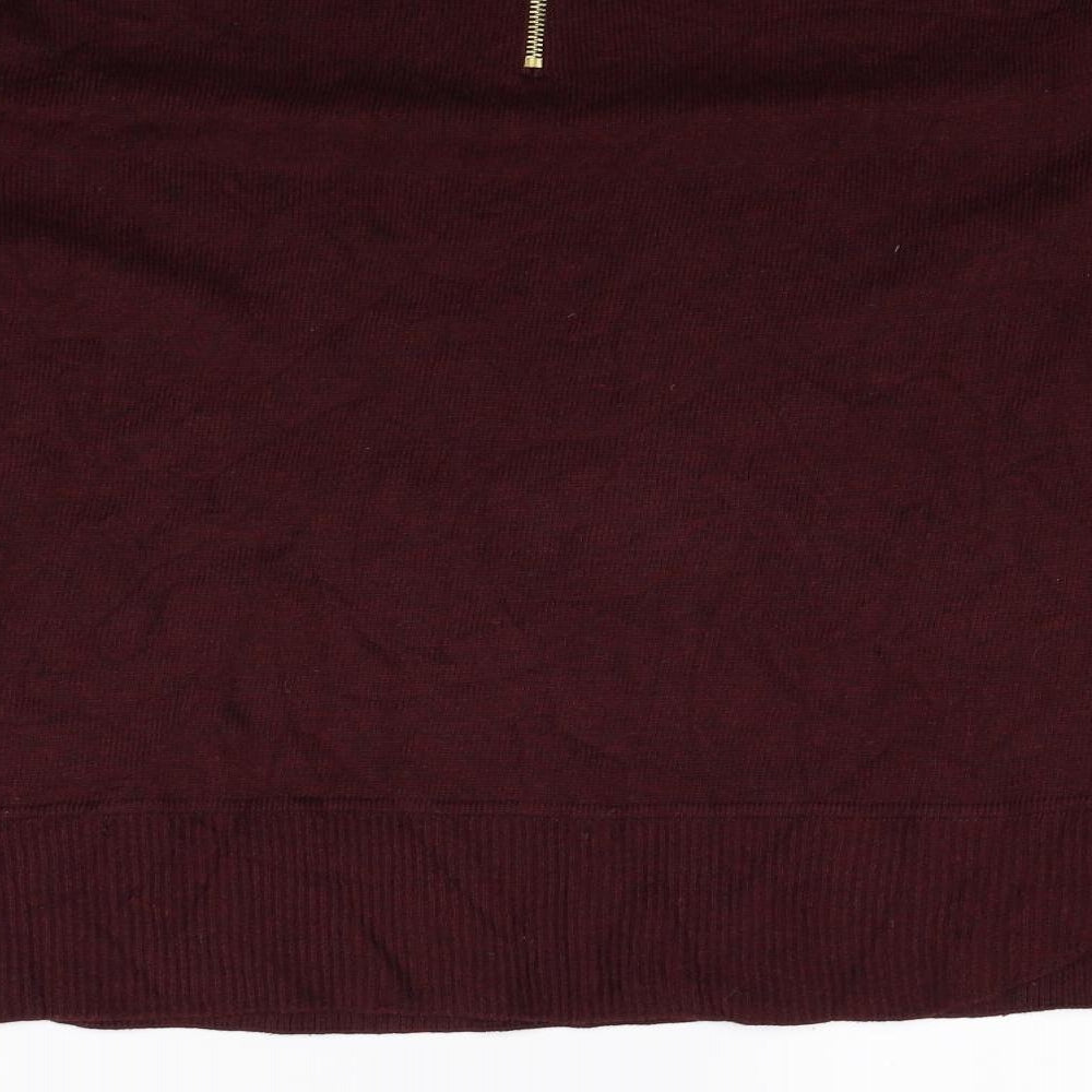 Brand and care label for H&M women’s red jumper, size S