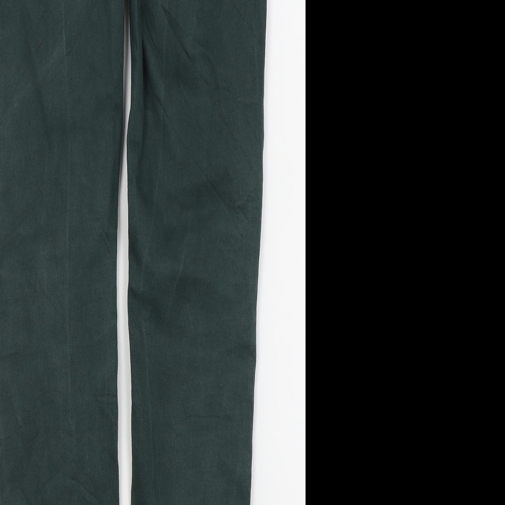 Brand and care label for farfallina women’s green skinny jeans, size UK 14, 20-inch leg