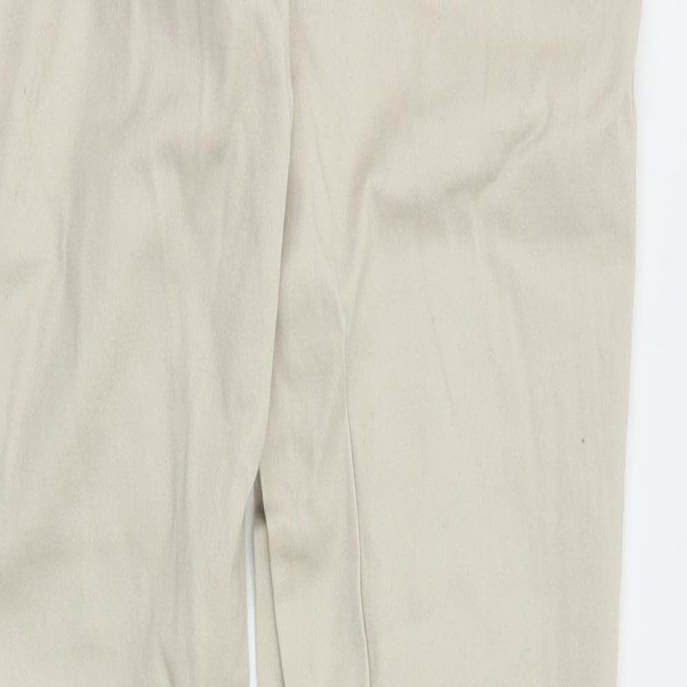 Brand and care label for Stradivarius women’s beige trousers, size UK 38, 29-inch leg
