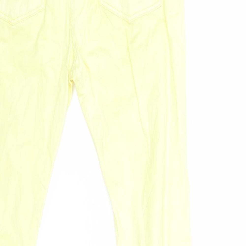 Brand and care label for Izzue women’s yellow denim skinny jeans, size UK 26, in, 30-inch leg