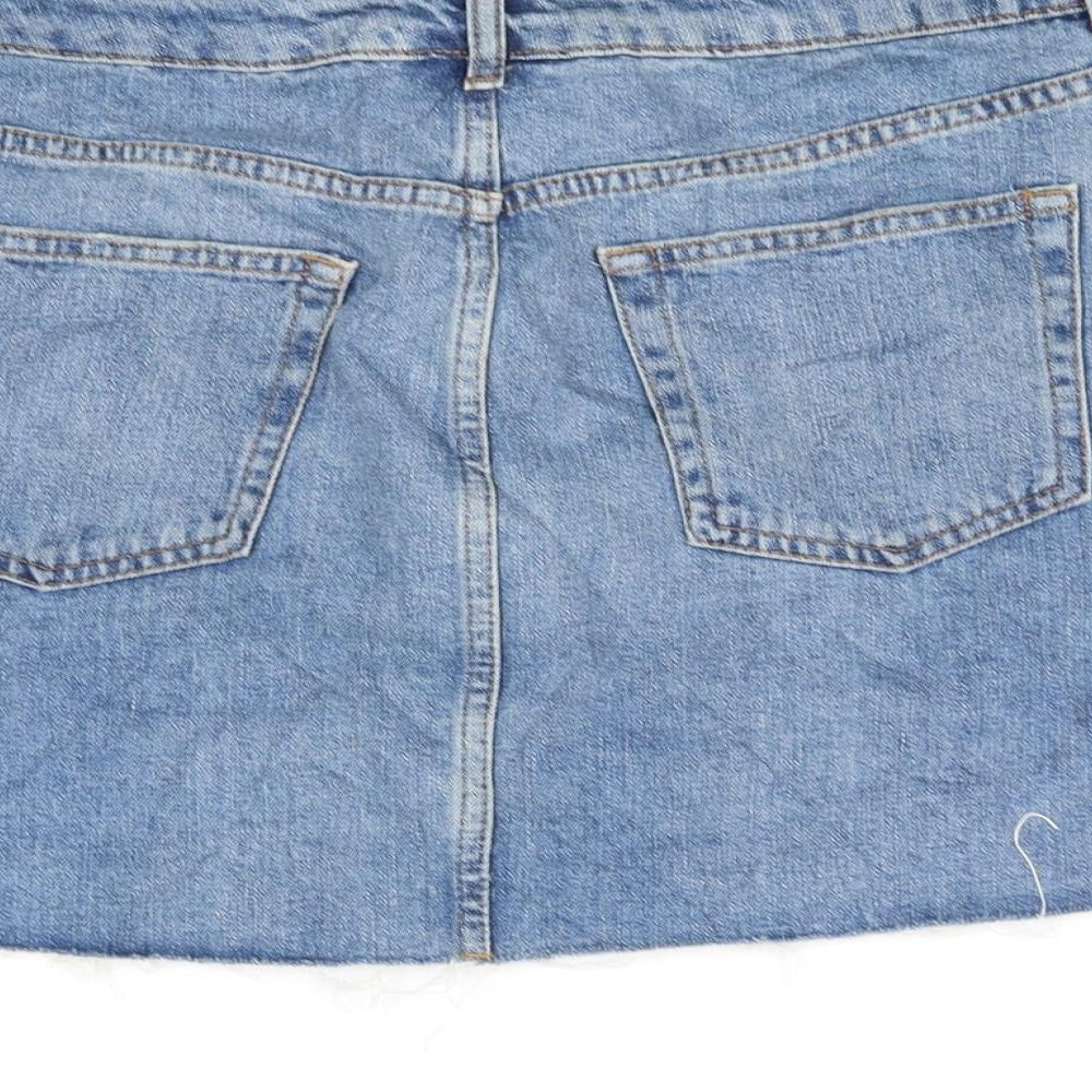 Brand and care label for Topshop women’s blue a-line skirt, size UK 10