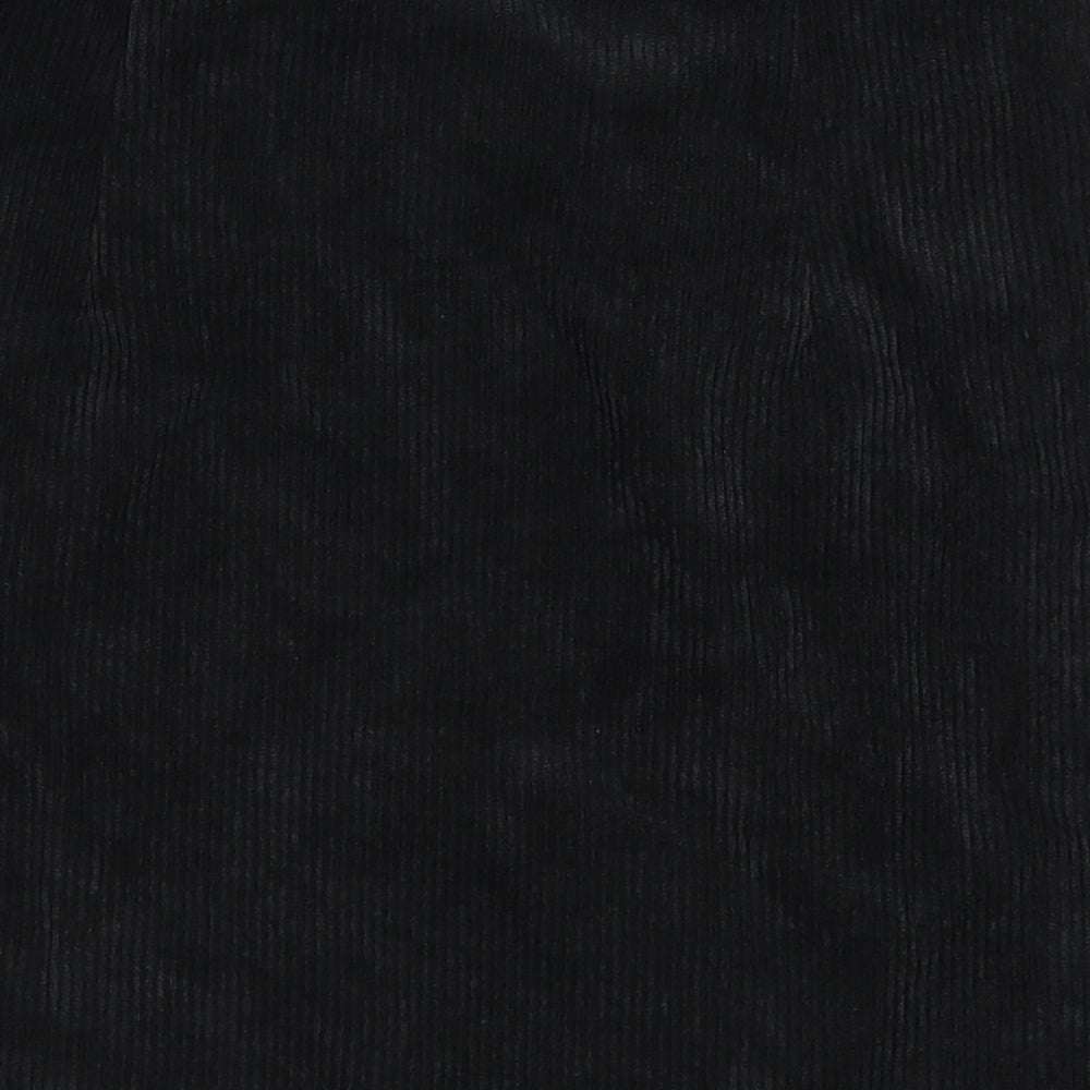 Brand and care label for Boohoo women’s black corduroy a-line skirt, size UK 8