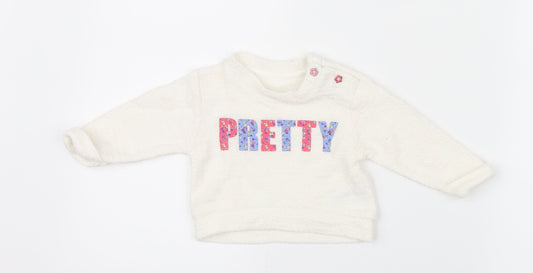 Additional front view of Nutmeg girls’ white jumper, size 0-3, months