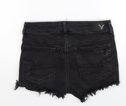 Back view of American Eagle Outfitters women’s black denim hot pants shorts, size UK 6, - distressed