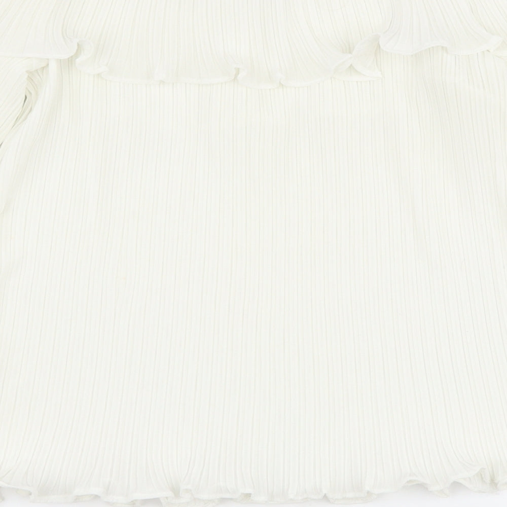 Brand and care label for PRETTYLITTLETHING women’s white basic blouse, size UK 12, - pleated