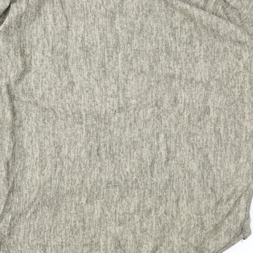 Brand and care label for Krisp women’s brown basic blouse, size M