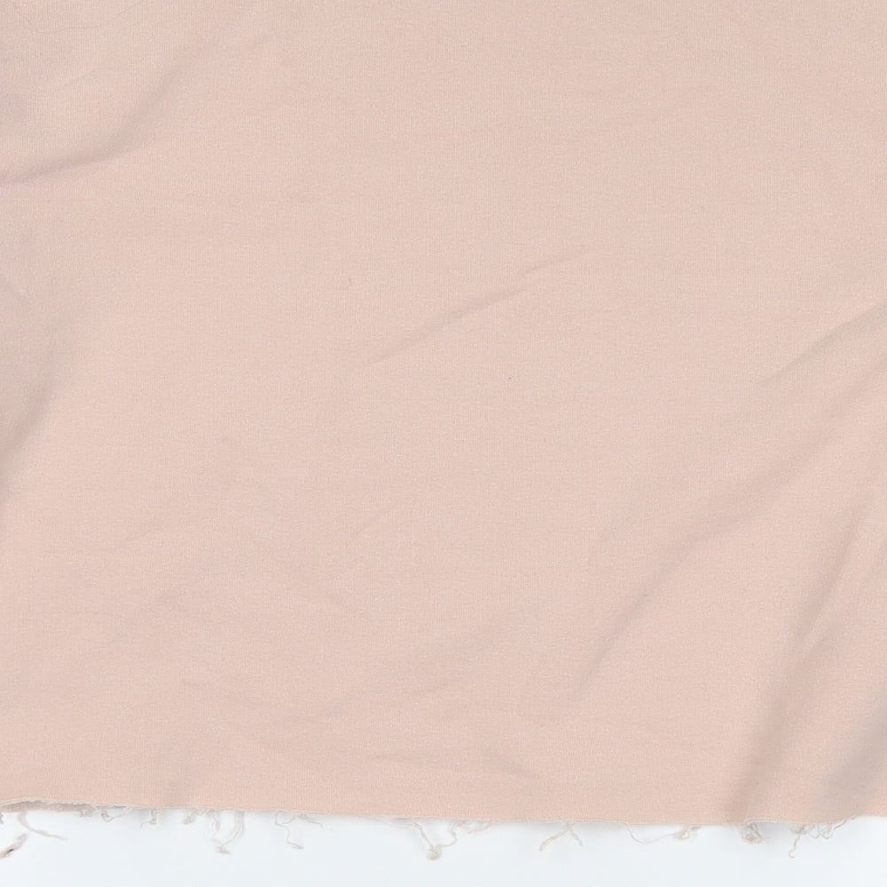 Brand and care label for Topshop women’s pink pullover sweatshirt, size UK 14