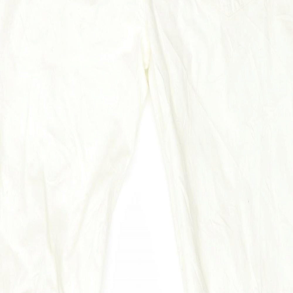 Brand and care label for Diamonds &Divas women’s white denim skinny jeans, size UK 12, 29-inch leg