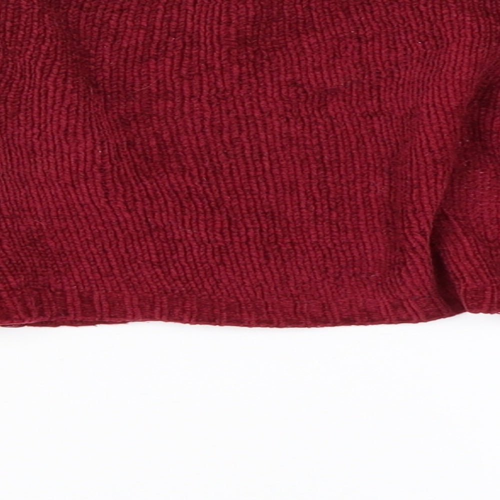 Brand and care label for Tutu Gorgeous girls’ red cardigan jumper, size 6, years