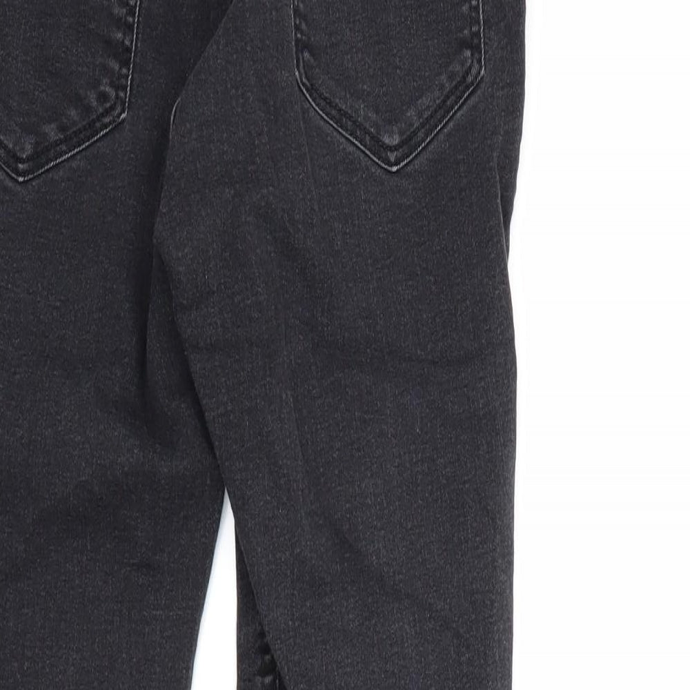 Brand and care label for Divided women’s black denim skinny jeans, size UK 10, 27-inch leg