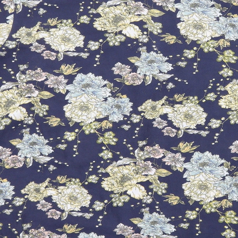 Brand and care label for H&M women’s blue floral basic blouse, size UK 12