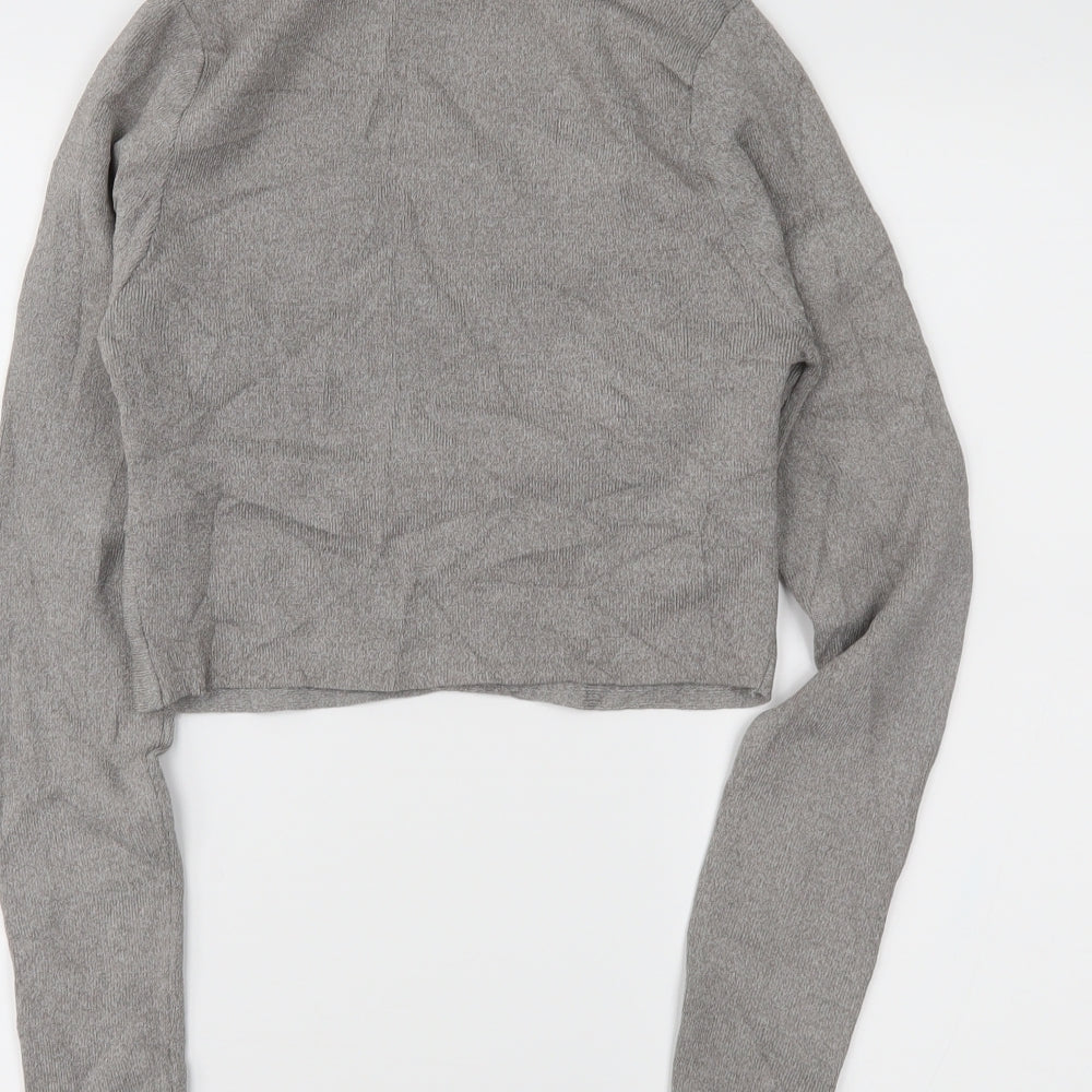 Brand and care label for New Look women’s grey cropped blouse, size UK 10