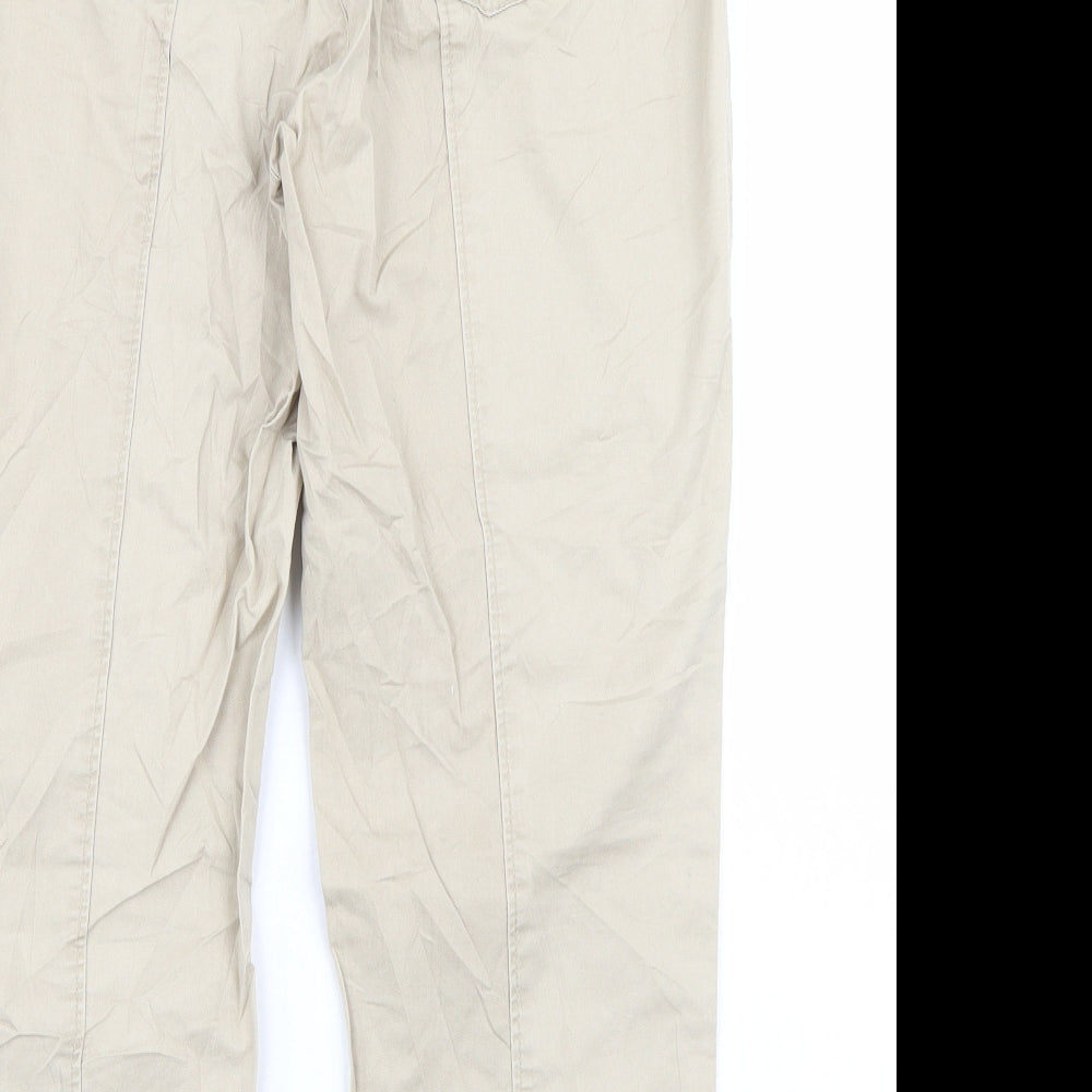 Brand and care label for Rocks women’s beige cropped jeans, size L, 23-inch leg
