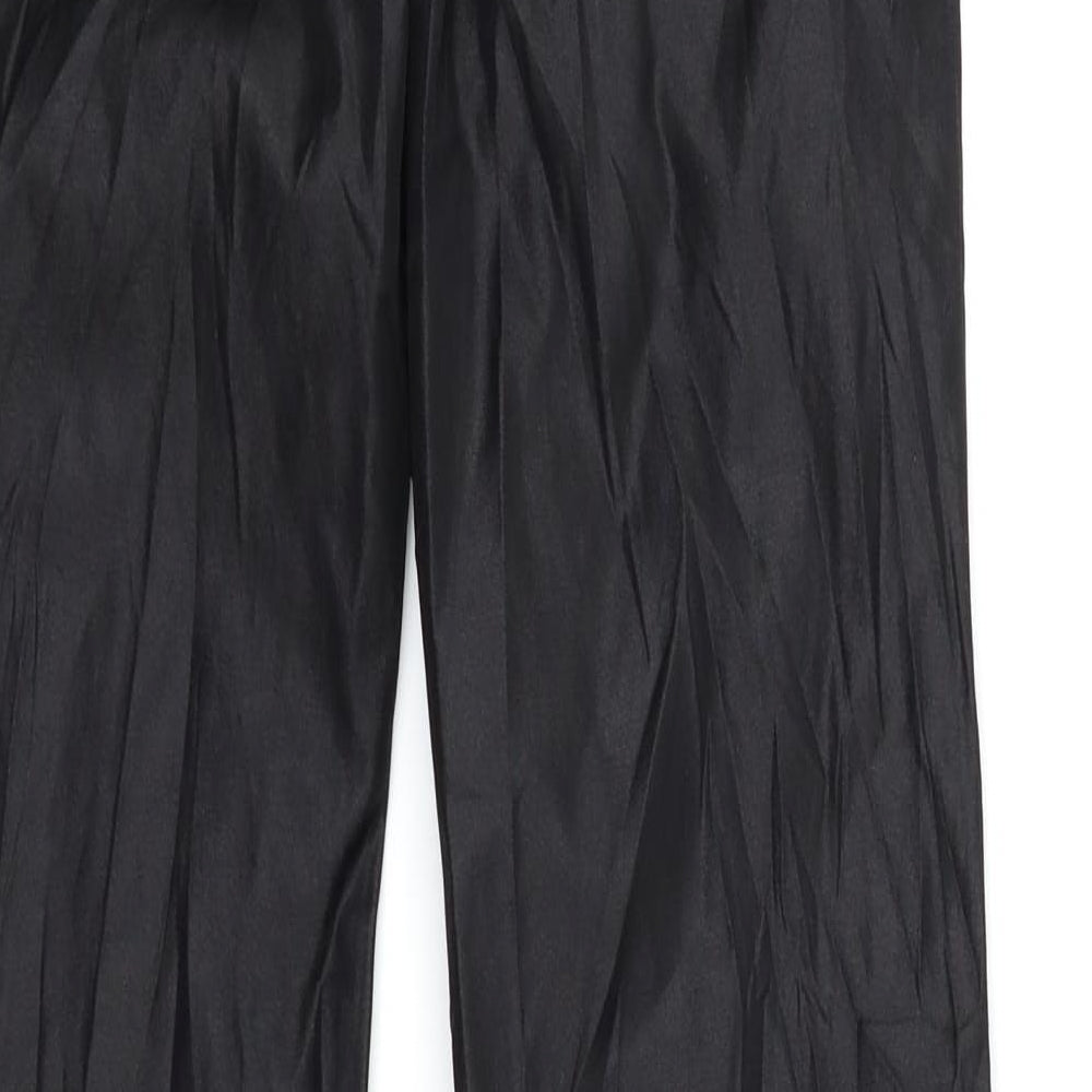 Brand and care label for CTM moda women’s black trousers, size UK 29, in, 30-inch leg - wet look