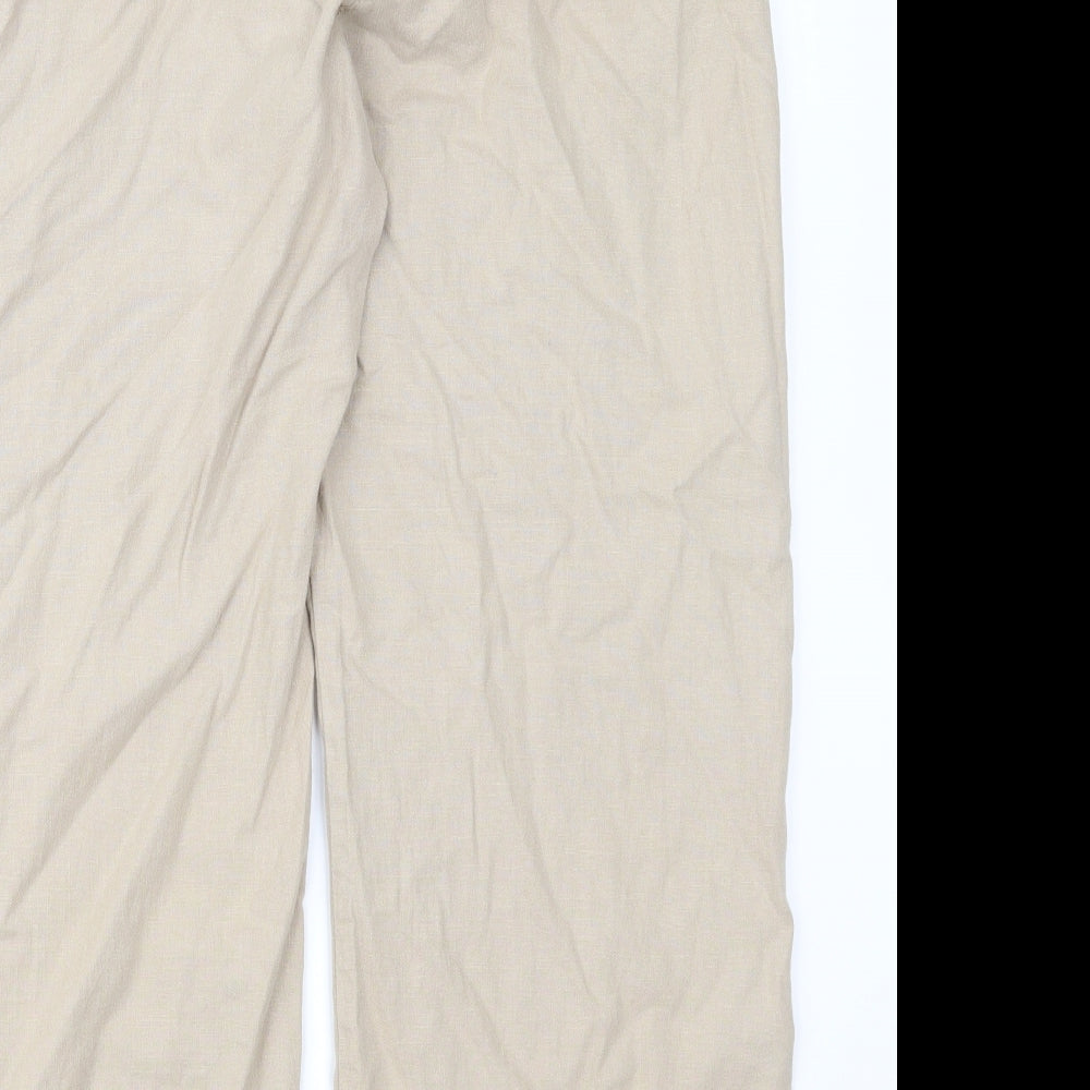 Brand and care label for Preworn women’s brown chino trousers, size UK 36, in, 27-inch leg
