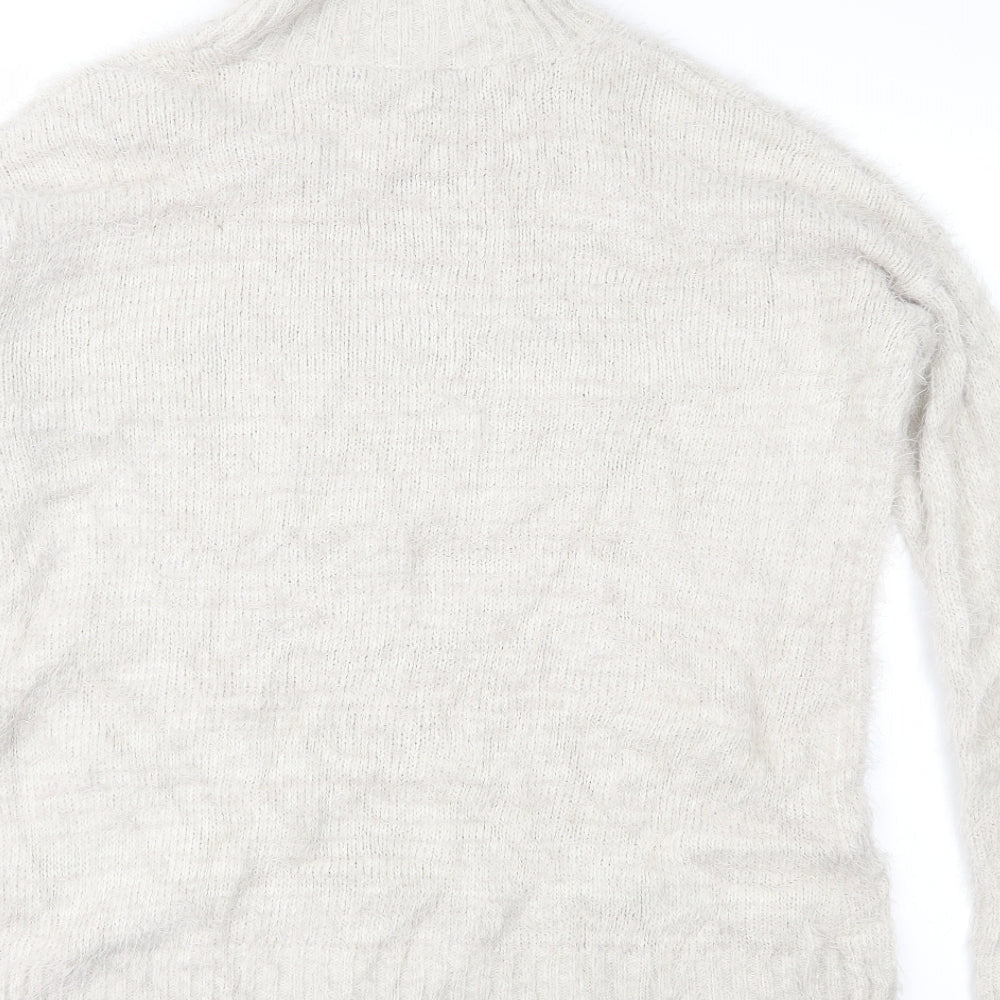 Brand and care label for Missguided women’s beige knit jumper, size UK 8