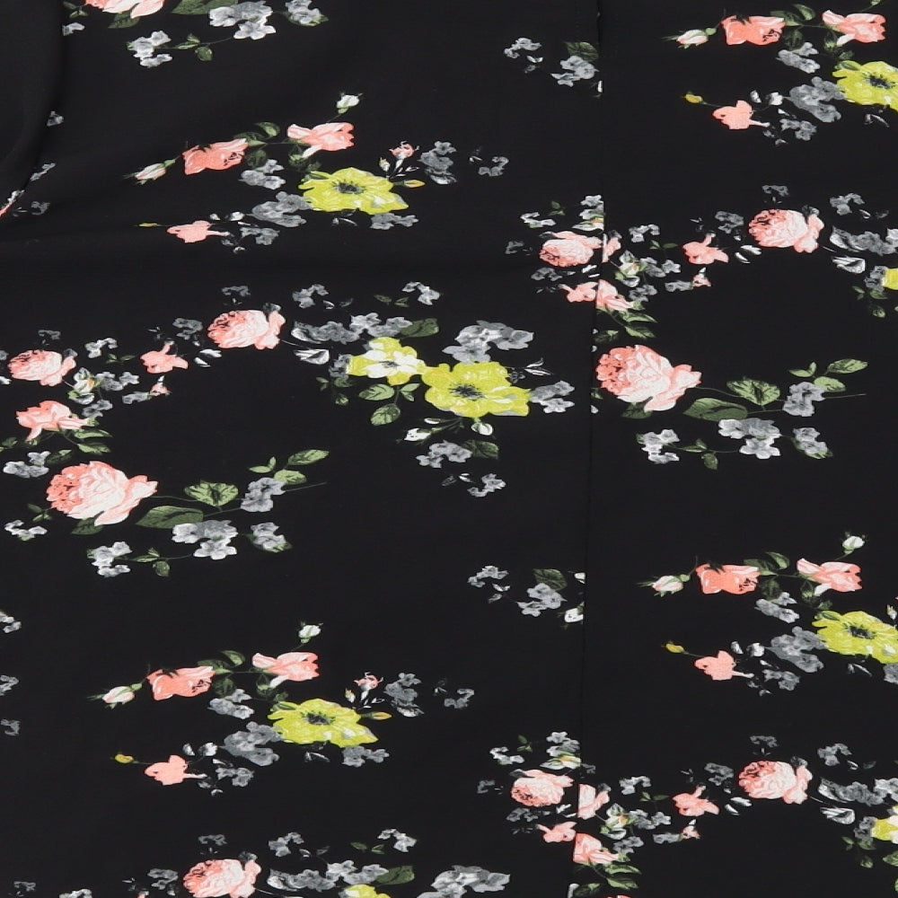 Brand and care label for Casual Twenty4 women’s black floral basic blouse, size UK 14