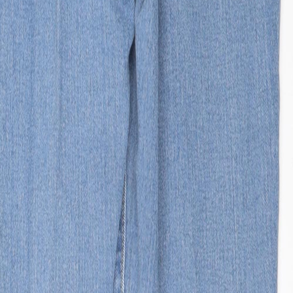 Brand and care label for PRETTYLITTLETHING women’s blue denim skinny jeans, size UK 4, 29-inch leg