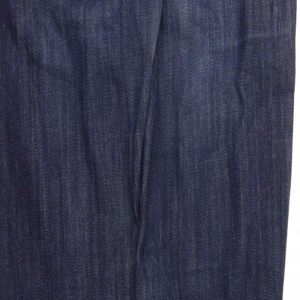 Brand and care label for H&M women’s blue skinny jeans, size UK 26, 32-inch leg