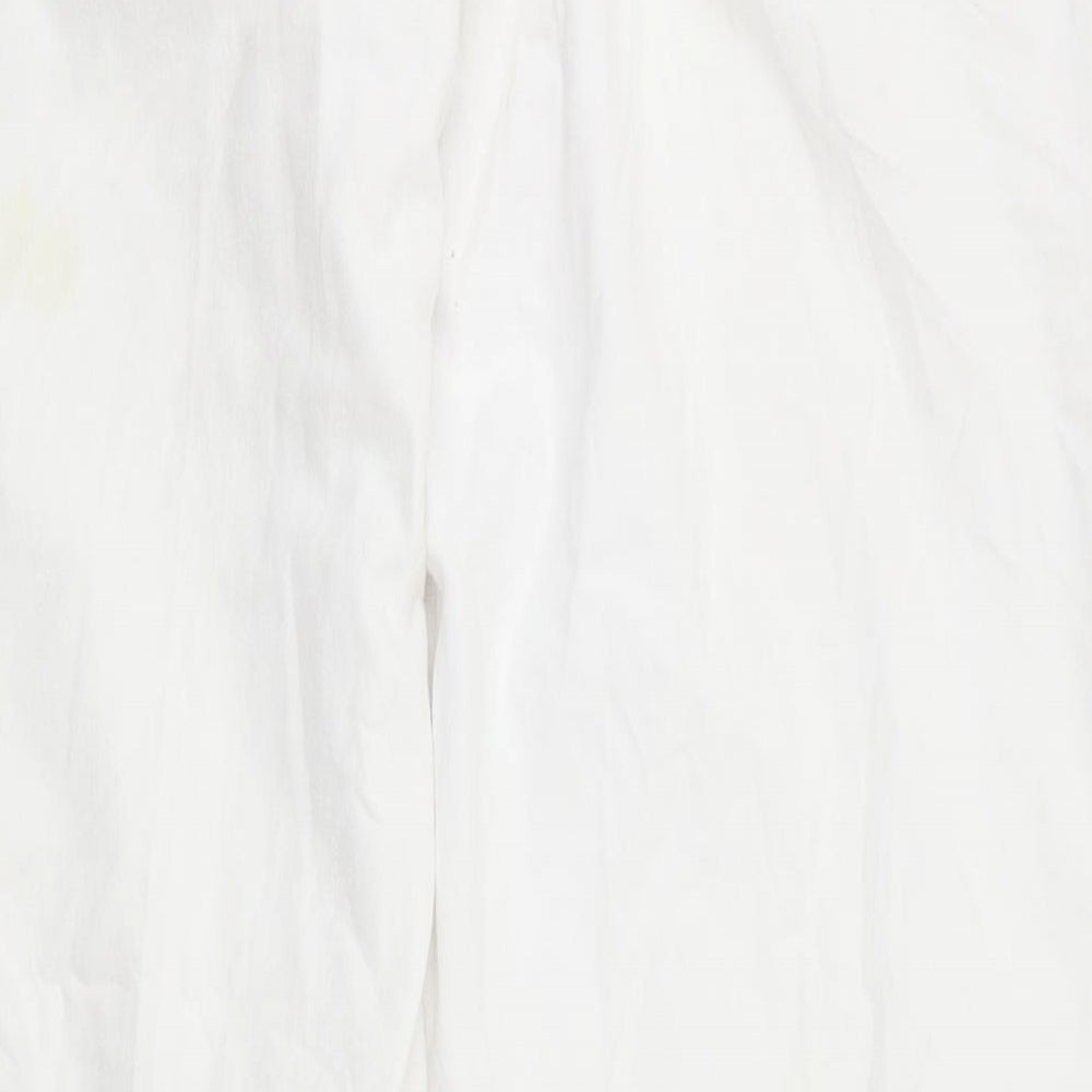 Brand and care label for Epilogue women’s white trousers, size UK 14, 31-inch leg