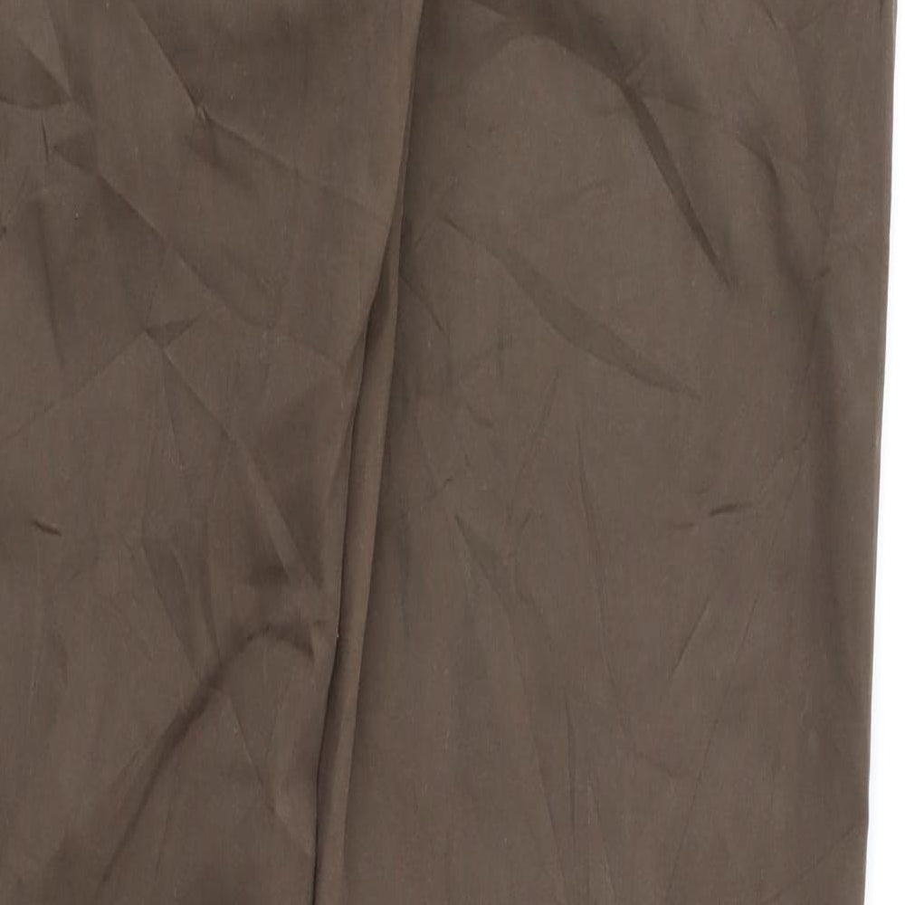 Brand and care label for LOGIC women’s brown trousers, size UK 40, 33.5-inch leg