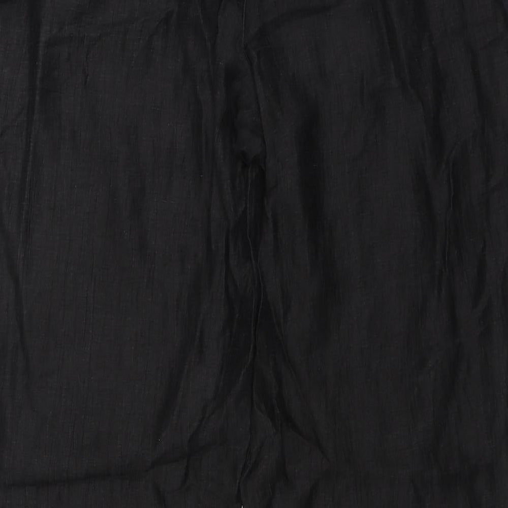 Brand and care label for Gelco women’s black trousers, size UK 14, 32-inch leg
