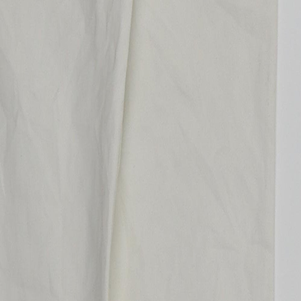 Brand and care label for 7 Days women’s white skinny jeans, size UK 6, 29-inch leg