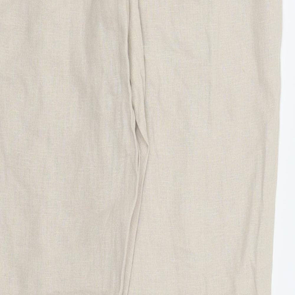 Brand and care label for Dorothy Perkins women’s beige trousers, size UK 12, 30-inch leg