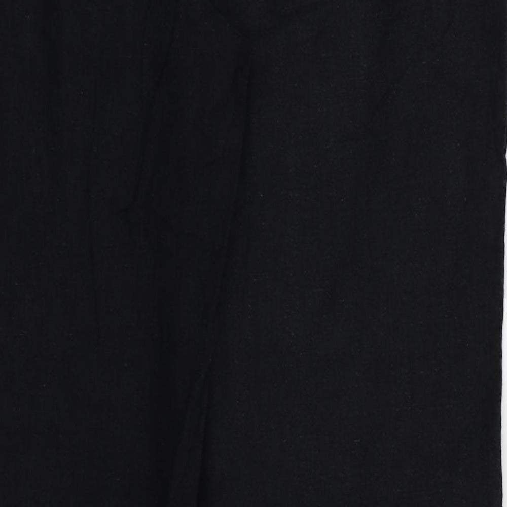 Brand and care label for Marks & Spencer women’s black trousers, size UK 14, 29-inch leg