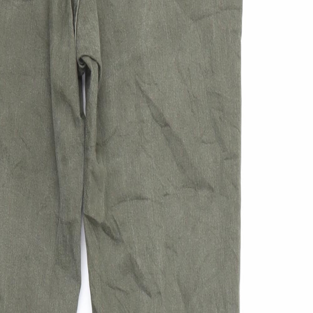 Brand and care label for H&M women’s green denim skinny jeans, size UK 10, 29-inch leg