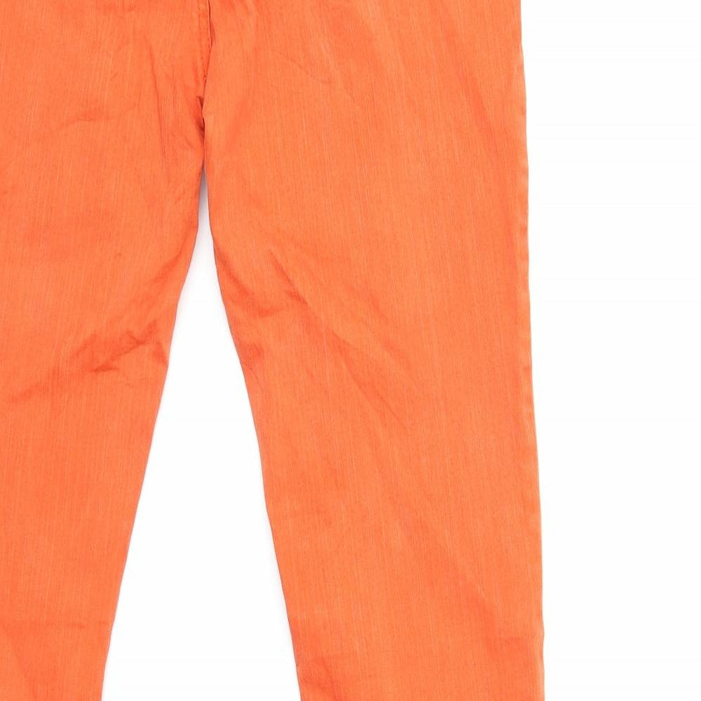Brand and care label for Street One women’s orange denim skinny jeans, size UK 30, in, 30-inch leg