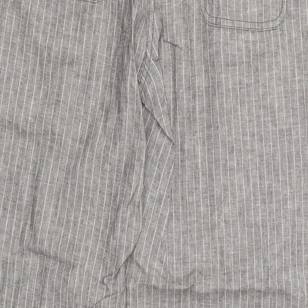 Brand and care label for Preworn women’s grey striped trousers, size UK 34, in, 28-inch leg