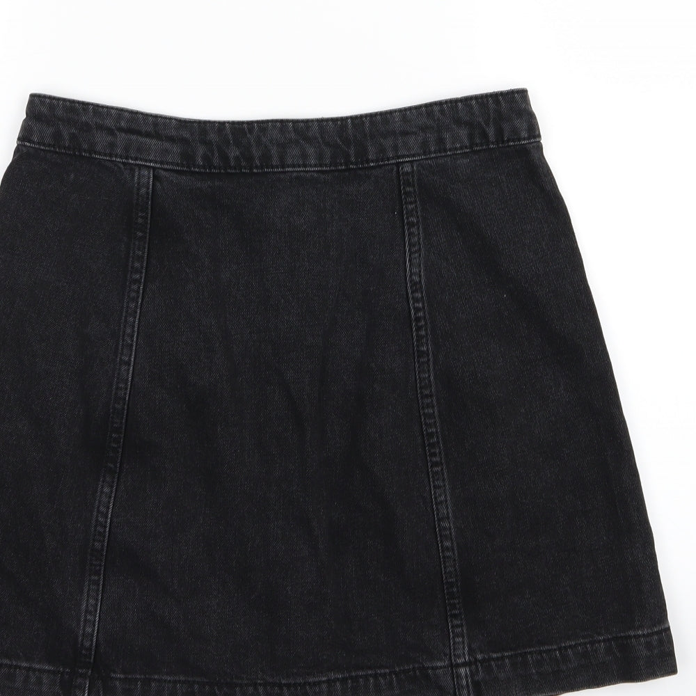 Brand and care label for Topshop women’s black denim a-line skirt, size UK 28, in