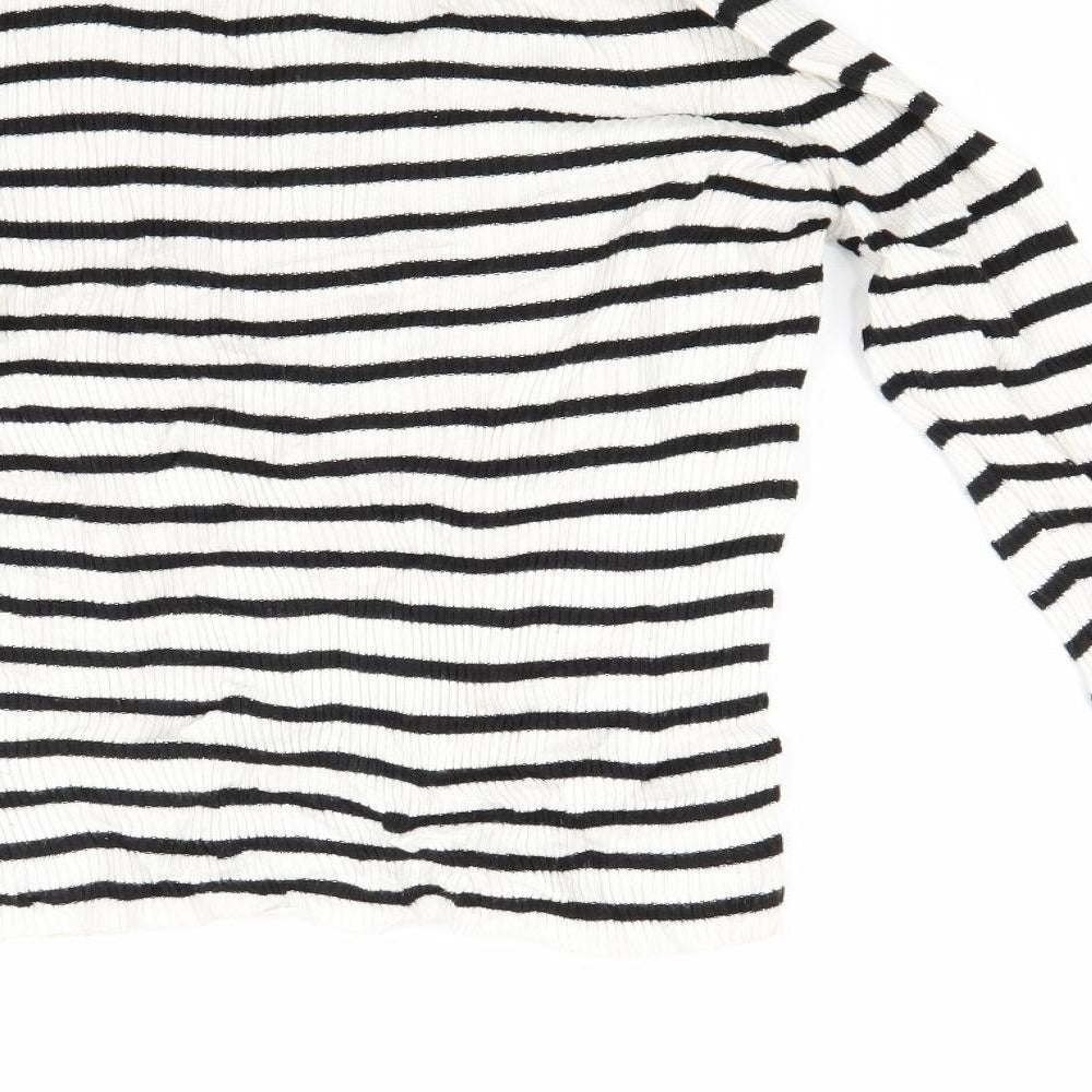 Brand and care label for Topshop women’s white striped knit jumper, size UK 8