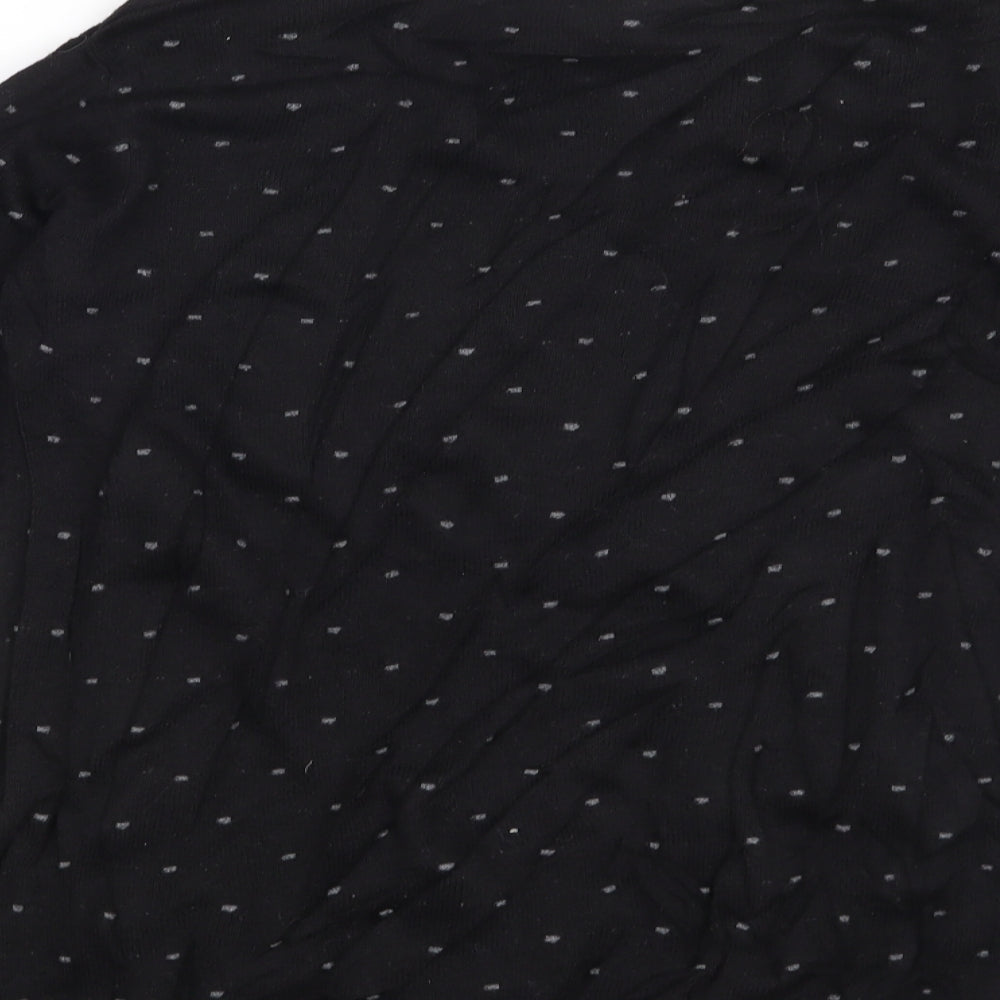 Brand and care label for Mango women’s black polka dot jumper, size S