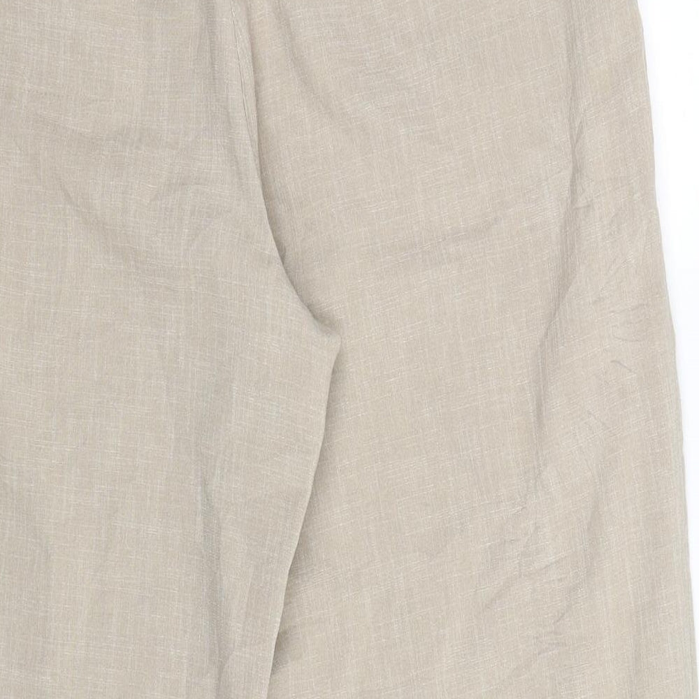 Brand and care label for Brandtex women’s beige trousers, size UK 16, 25-inch leg