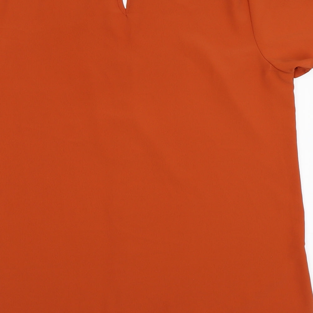 Brand and care label for New Look women’s brown basic blouse, size UK 14