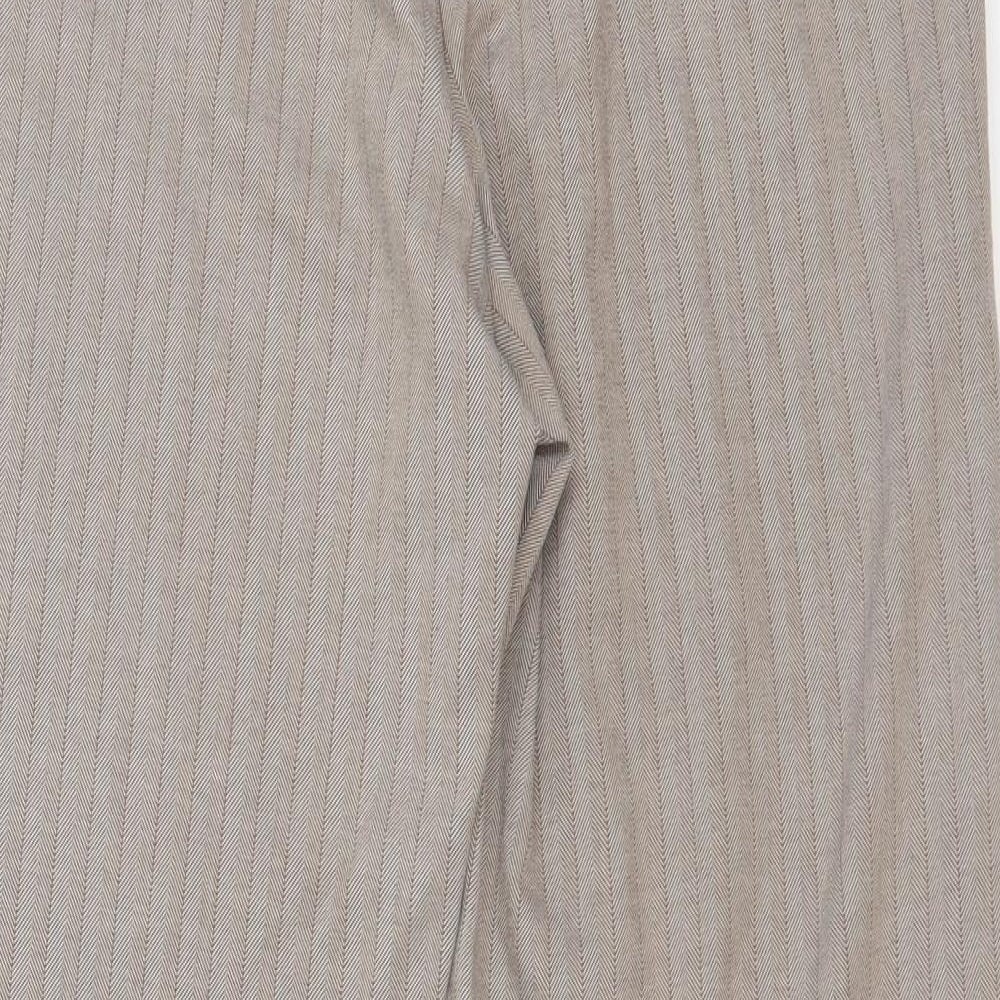 Brand and care label for Magi women’s beige trousers, size UK 16, 26-inch leg