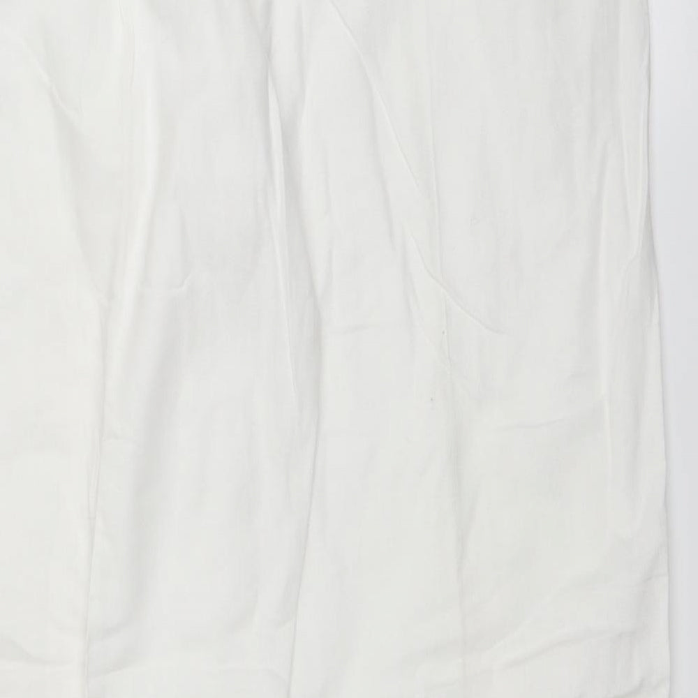 Brand and care label for ELVI women’s white trousers, size UK 18, 29-inch leg