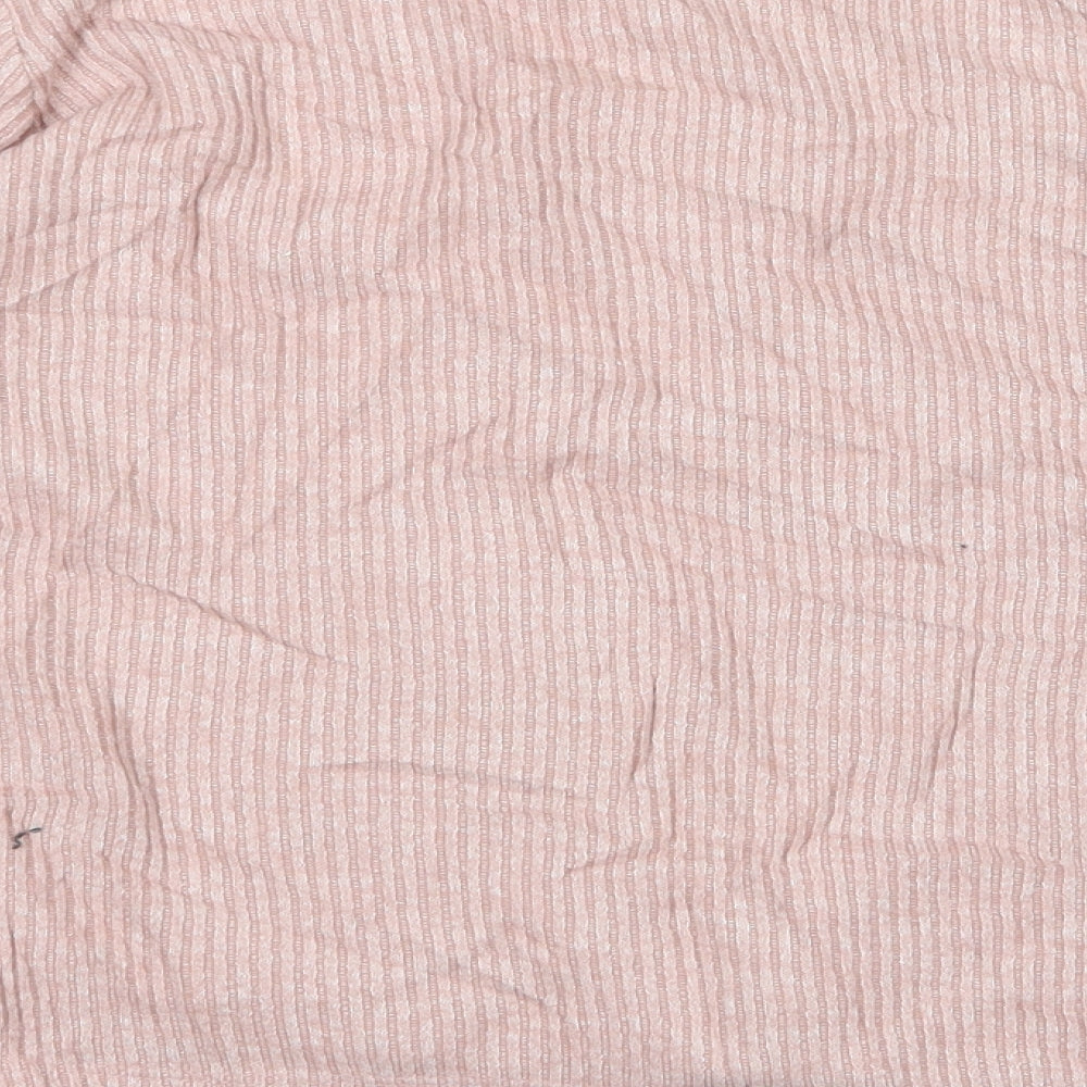 Brand and care label for New Look women’s pink jumper, size S